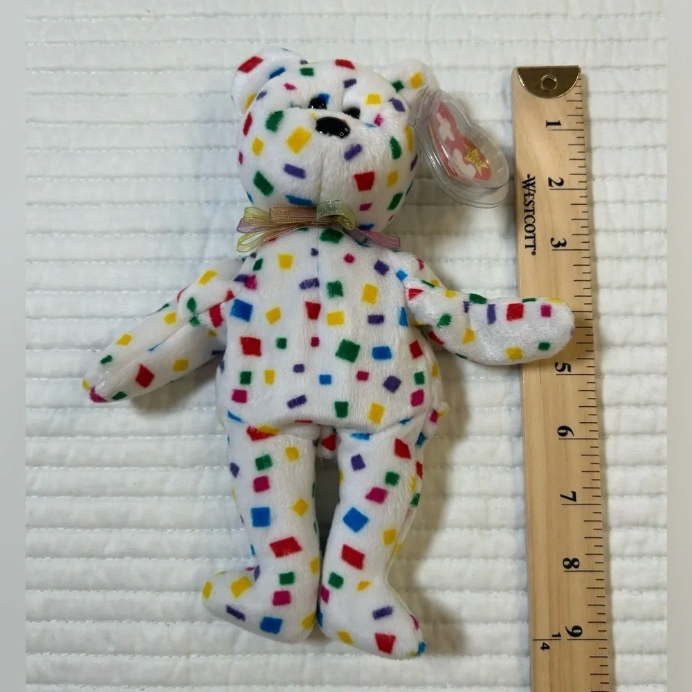 Retired, Vintage and Rare Ty Y2K Confetti Bear Beanie Baby with Errors.